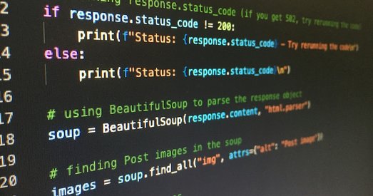 Close-up of a computer screen displaying Python code, including an if-else statement and use of the BeautifulSoup library for web scraping.